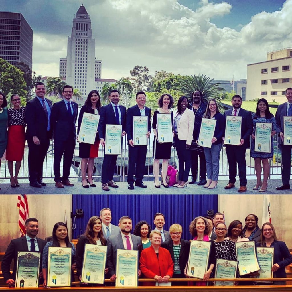 Author receiving scroll of recognition from LA County Board of Supervisors