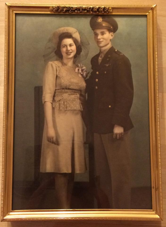 Wedding photo of a couple in World War II with the groom in US military uniform