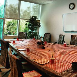 Office conference room decorated for picnic themed team retreat