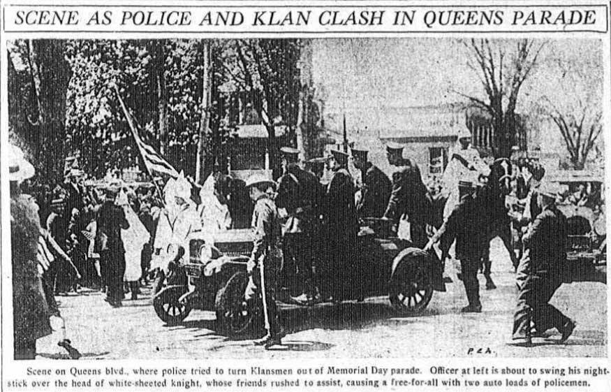 Black & white newspaper photo of a KKK march in New York in 1927 in which President Trump's father was arrested.