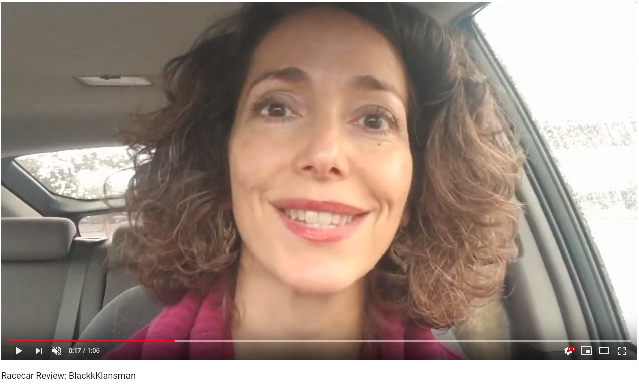 image of author speaking to camera in her car