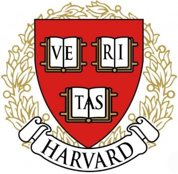 The Harvard College emblem: a shield with the word "VERITAS" on it