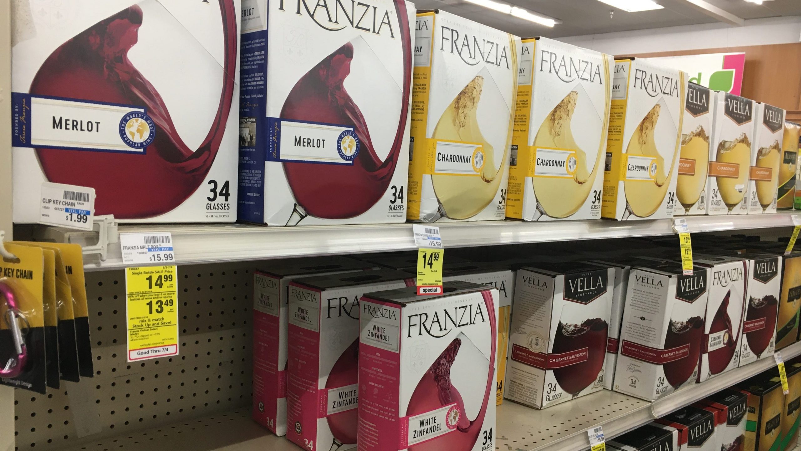 Photo of grocery store shelves loaded with boxes of Franzia wine